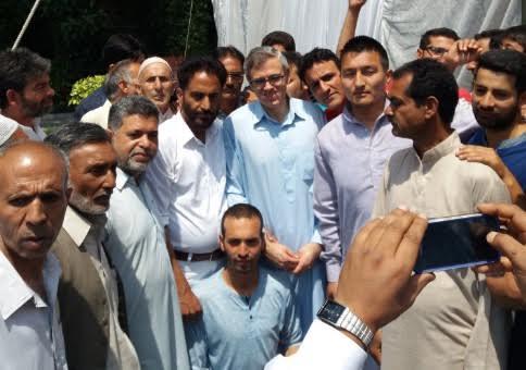 People throng Omar's residence to extend Eid greetings